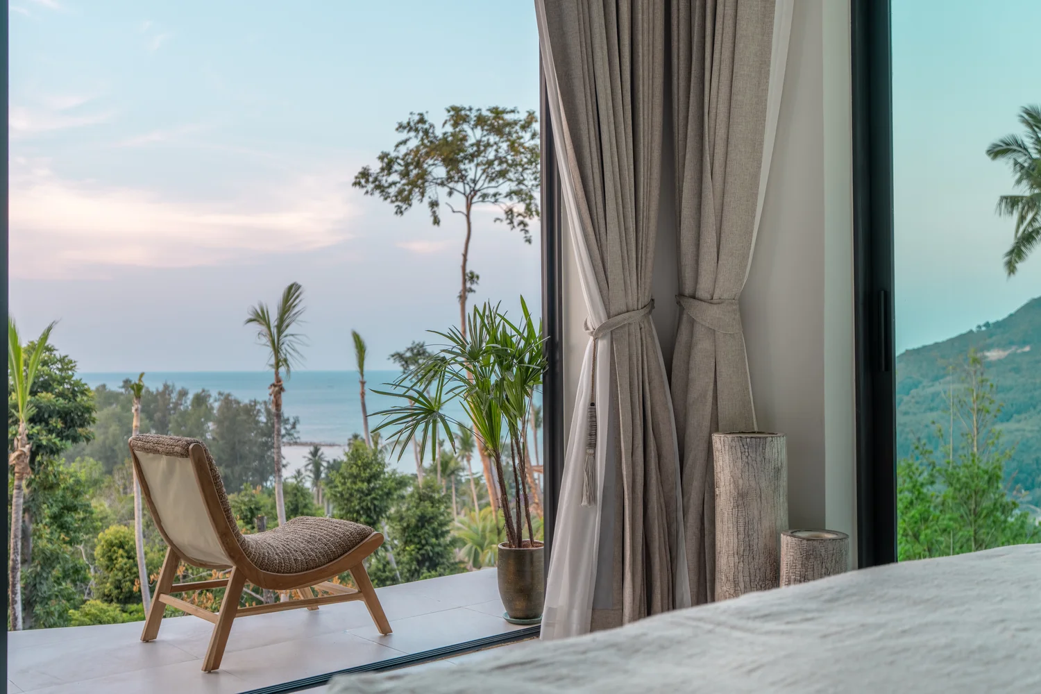Penthouse living with hanging chairs
